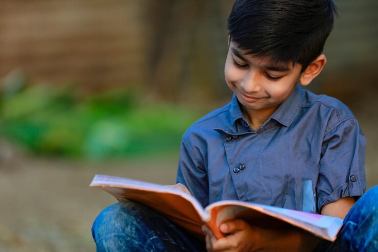 indian rural child reading book 75648 707